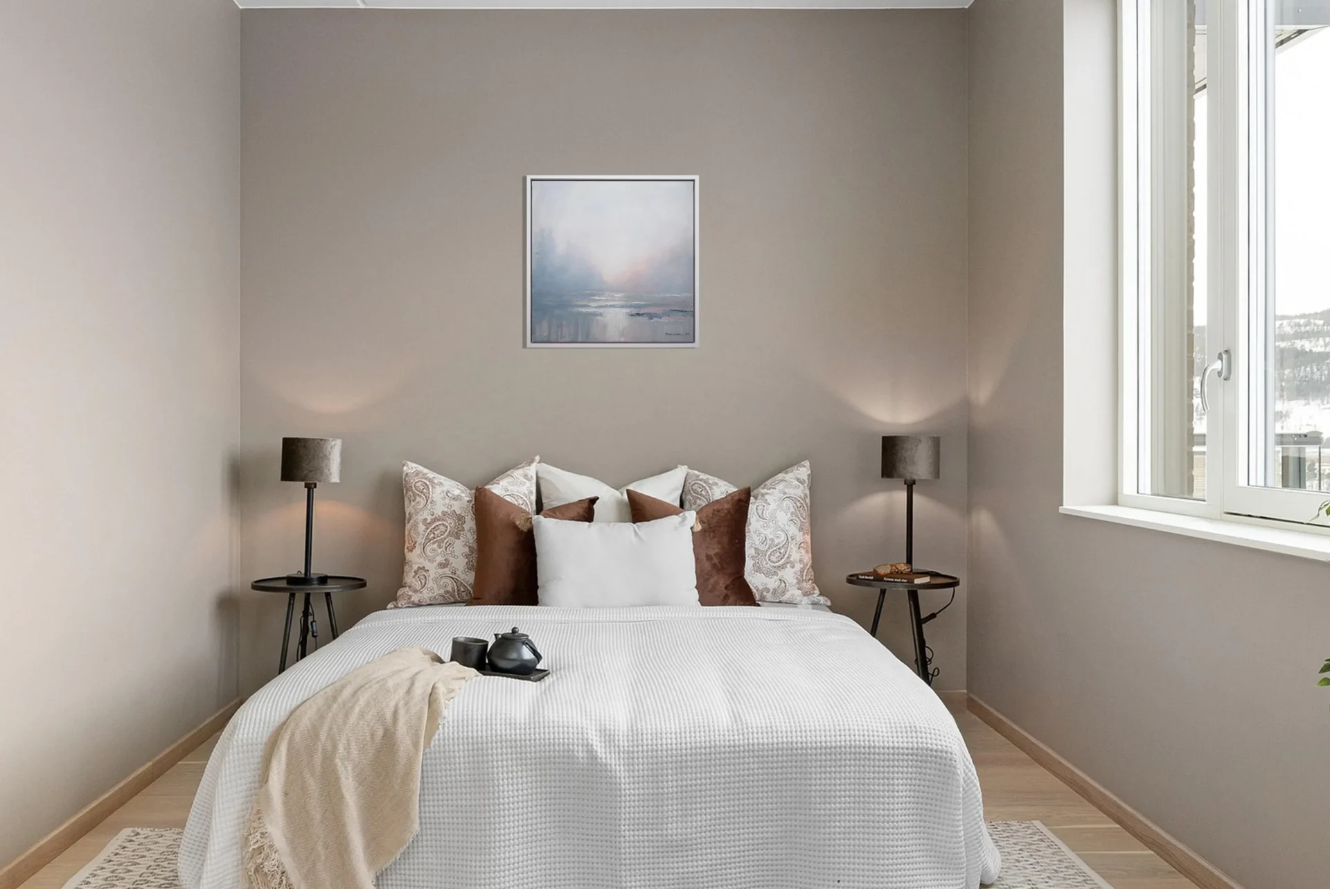 An original artwork placed in a calm interior.