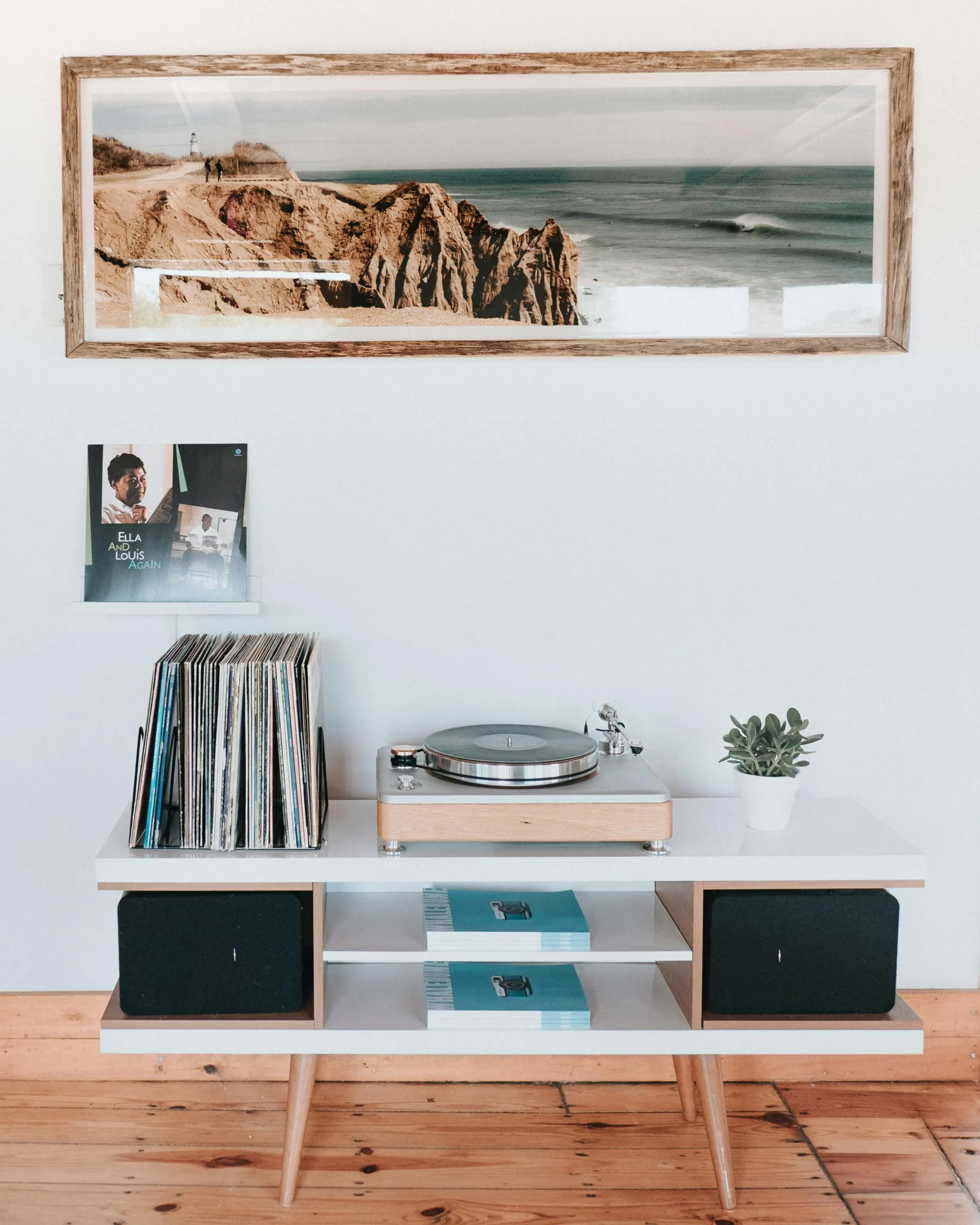 A layered interior with art, objects, light, and a calm arrangement.