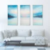 Ethereal Horizon Symphony triptych anchoring a refined white living room, large scale art for living rooms that ask for presence.