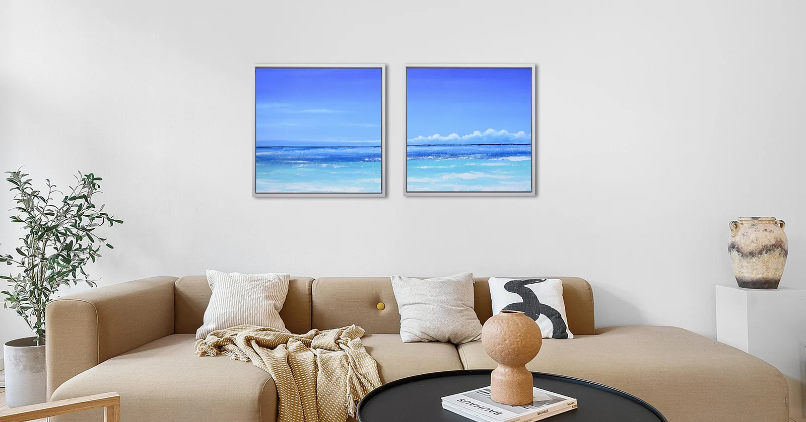 Coastal horizon diptych displayed in a living room.