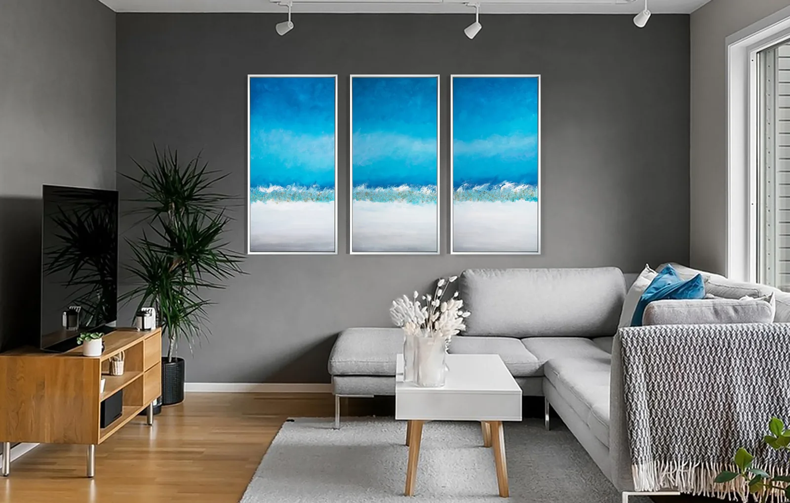 Coastal Horizon triptych in a modern living room.