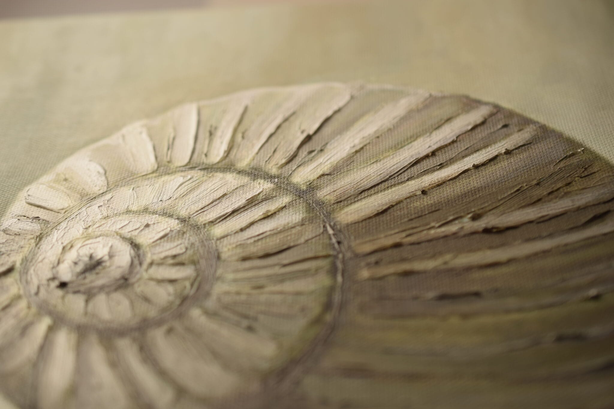 Verso of canvas with BONUM mark, raking light over the weave