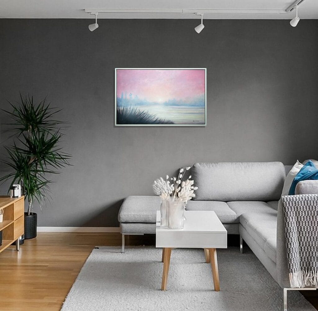 Blush of Morning original framed acrylic painting displayed above a sofa in a contemporary living room.