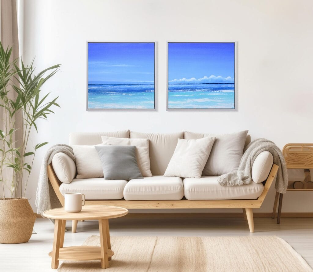 Azure Horizon I and Azure Horizon II displayed together as a coastal limited edition pair above a sofa in a bright living room.