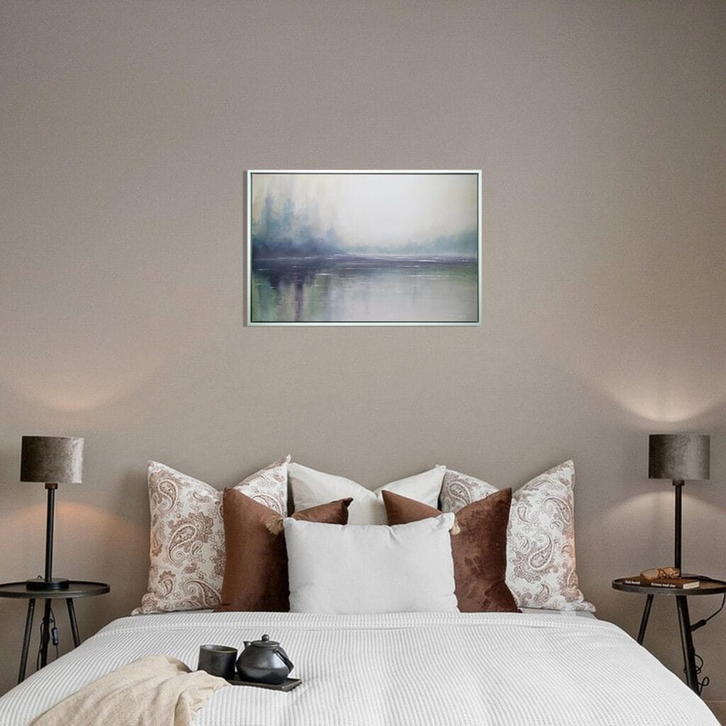 Echoes of Stillness original framed artwork displayed above a bed in a softly lit neutral bedroom.