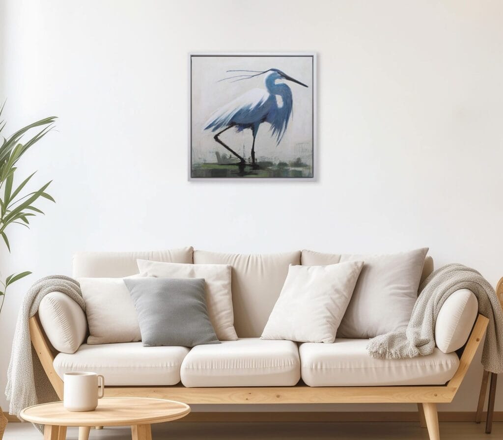 Elegant Heron Study limited edition bird artwork displayed above a neutral living room sofa by Bonum Art Gallery