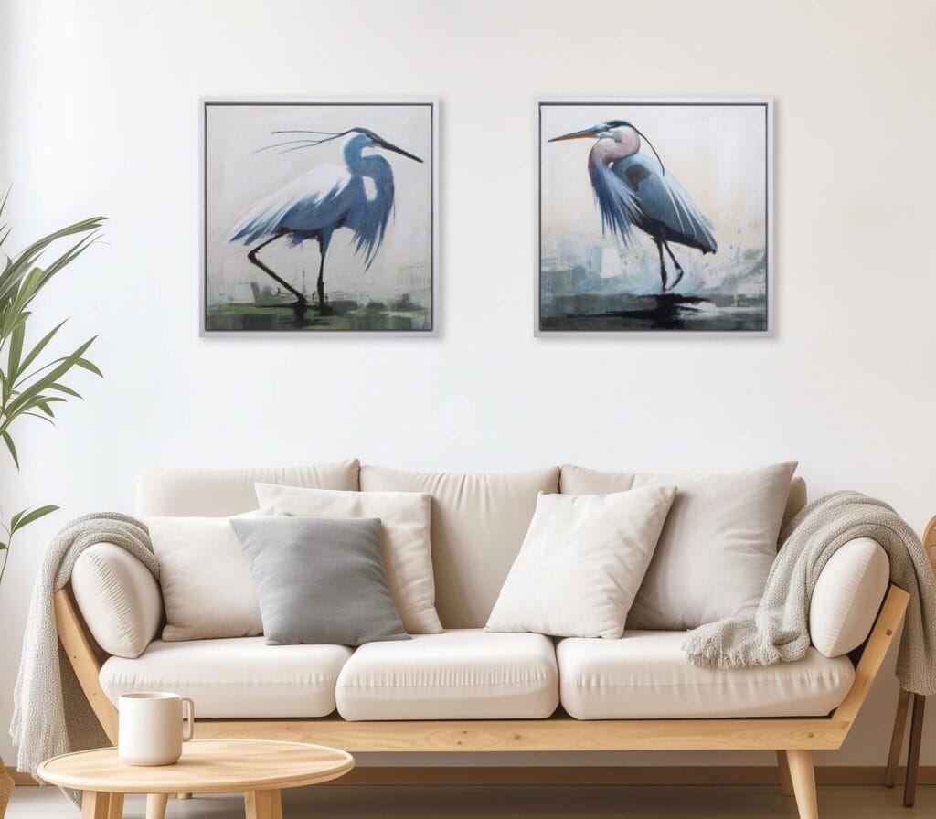 Coastal Birds heron limited edition artworks displayed above a neutral living room sofa by Bonum Art Gallery