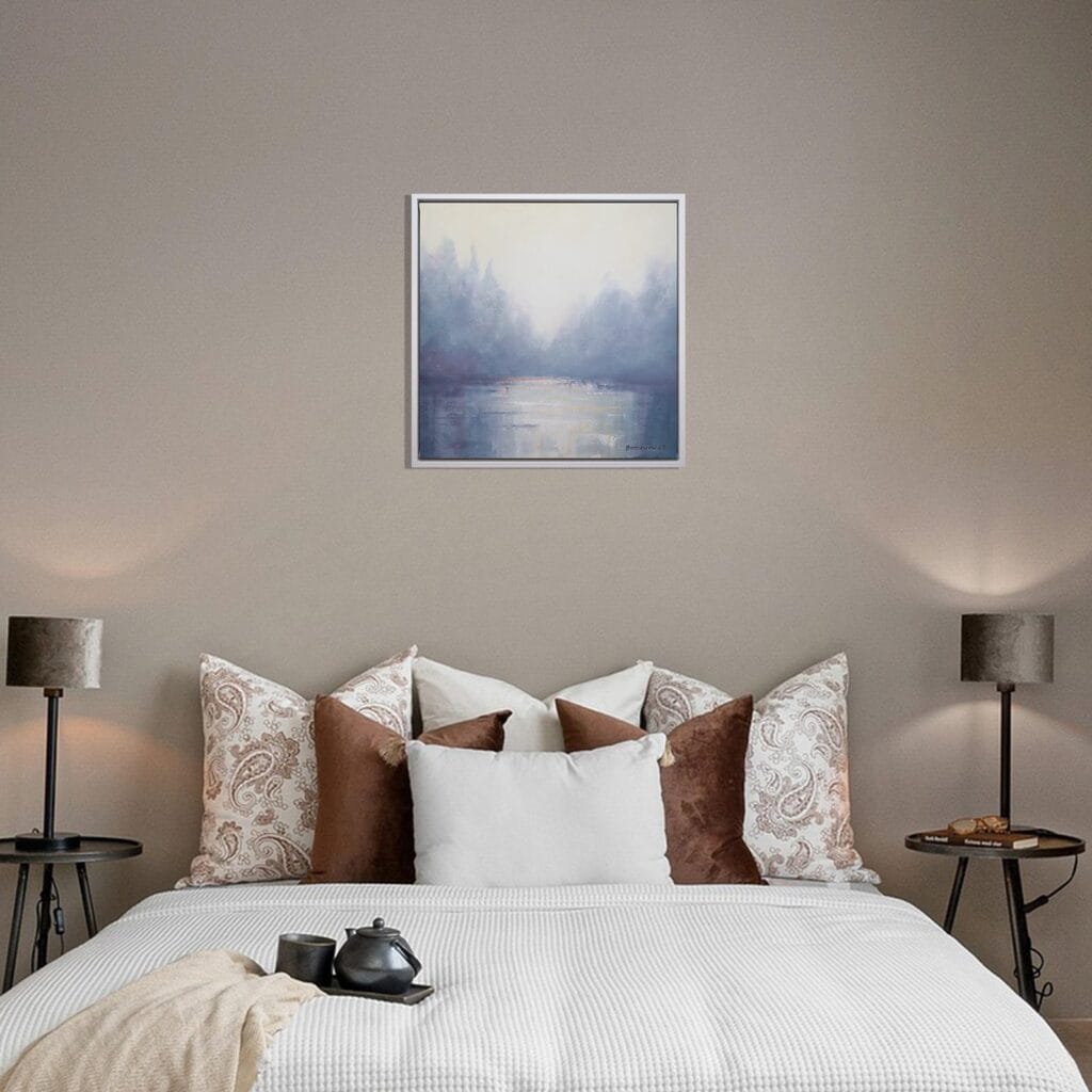 Misty Dawn original framed acrylic painting displayed above a bed in a calm neutral bedroom.